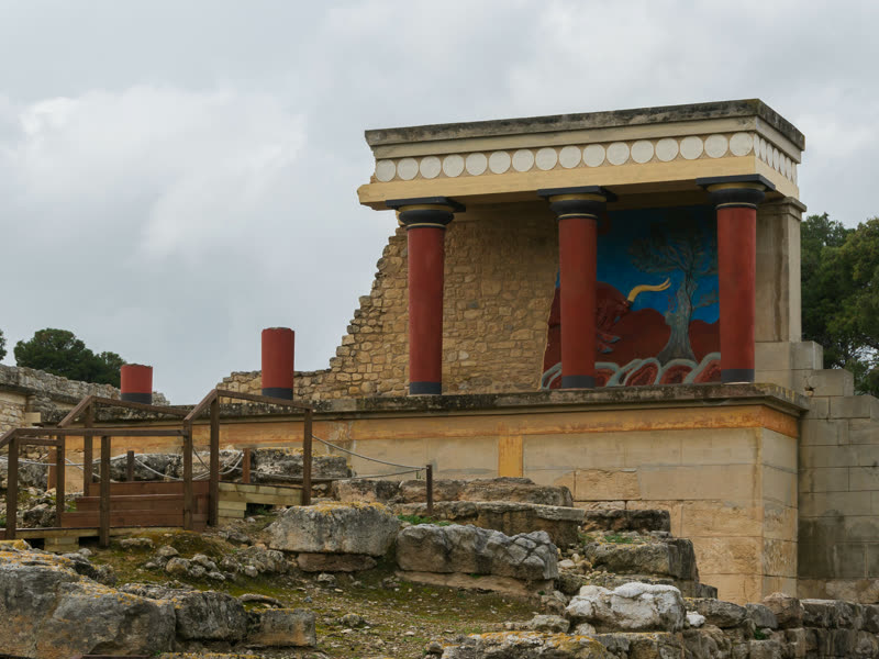 The north entrance of the palace of Knossos with its red Minoan columns